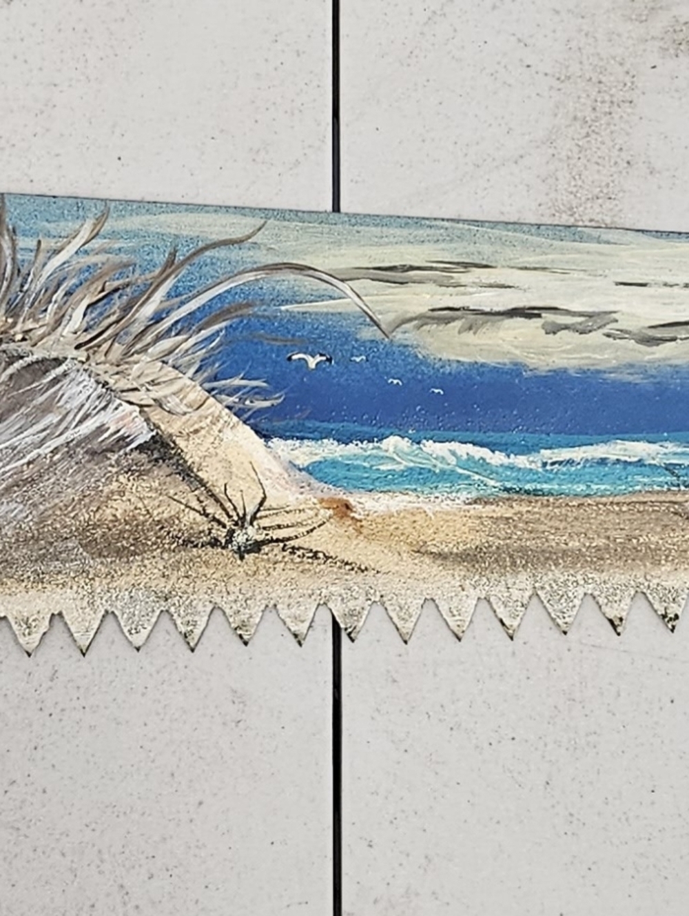 Coastal Beach Scene Wall Art - Blue, Tan, White On Hand Saw With Wooden Handle.